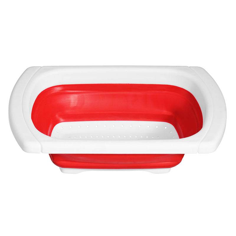 Red and white rectangular collapsible colander shown empty from above.