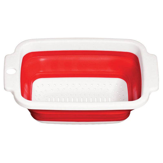 Red and white foldable colander with side handles shown from overhead.