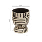 Size reference for a white and black geometric patterned planter with height and width measurements labelled